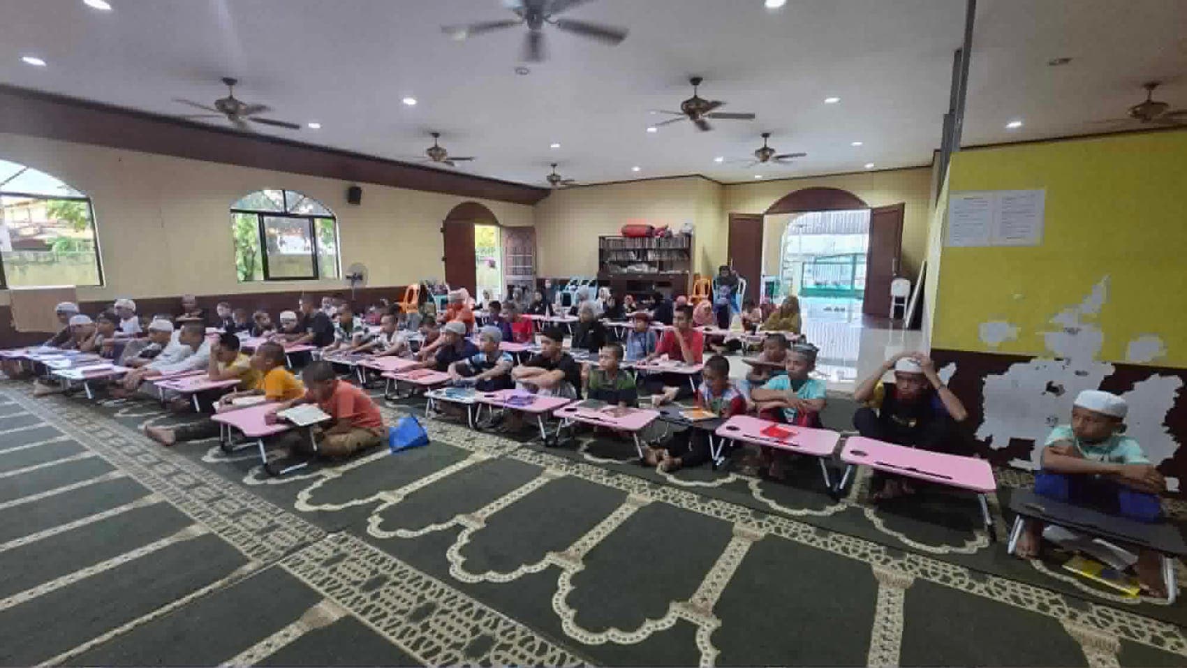 A full classroom of learners using the curriculum at the Olayn Islamic Foundation